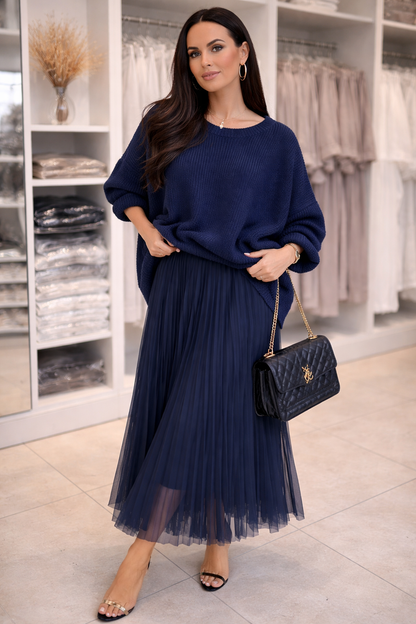 Coordinato elegante in maglia con gonna a pieghe