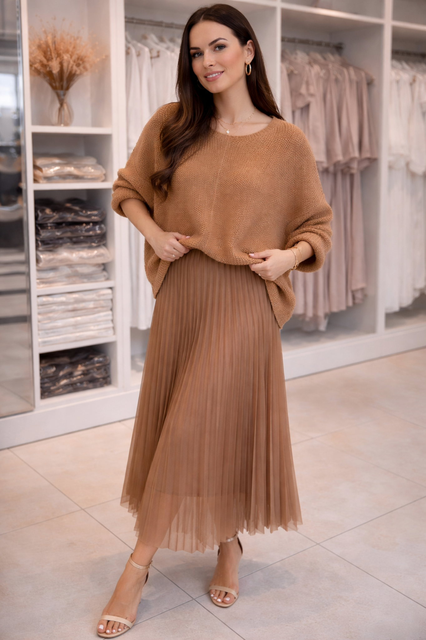Coordinato elegante in maglia con gonna a pieghe