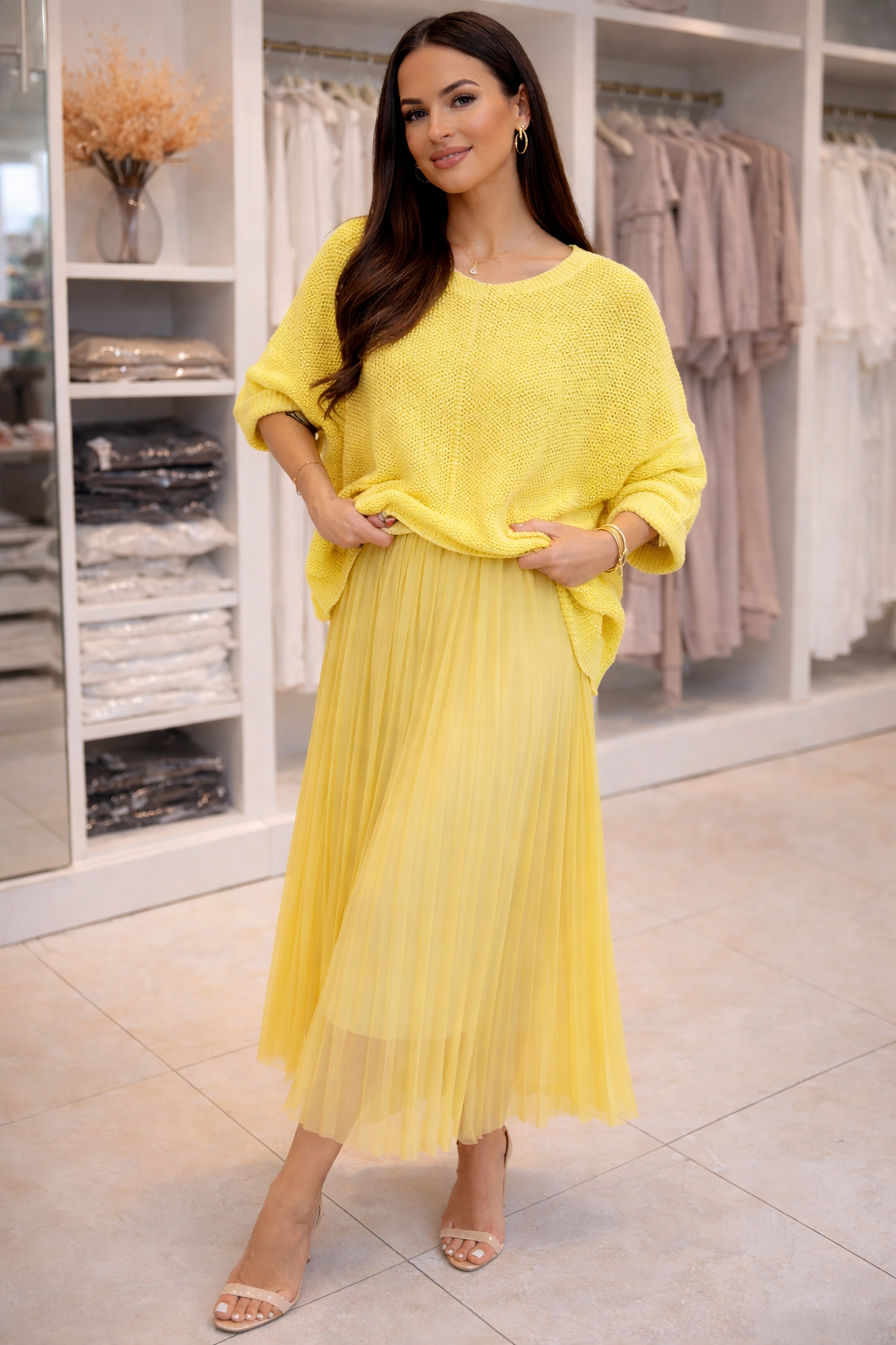 Coordinato elegante in maglia con gonna a pieghe