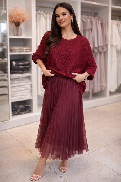 Coordinato elegante in maglia con gonna a pieghe